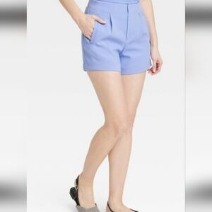 A NEW DAY JUNIOR WOMEN'S HIGH WAISTED TAYLORED PURPLE SHORTS. SIZE 17/ NWT